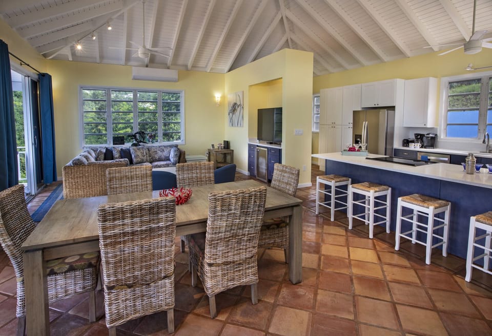 The elegant dining area with AC, adjacent to the kitchen.