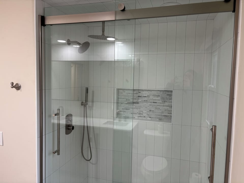 Brand new shower with 3 different showerheads 