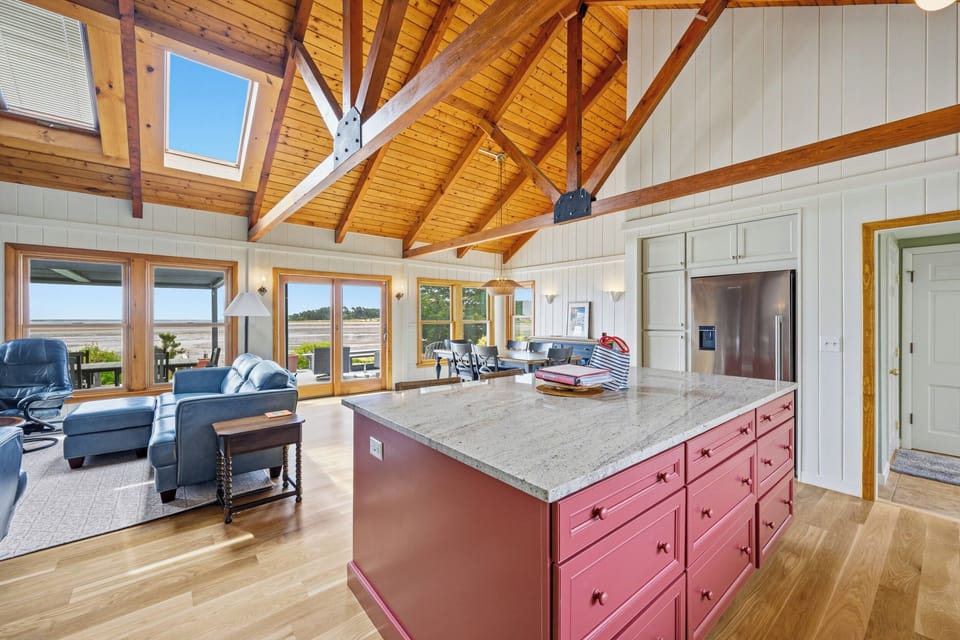 Kitchen Island with Dining and Living Space in Background