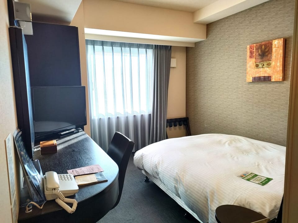Desk, WiFi (free), bed sheets