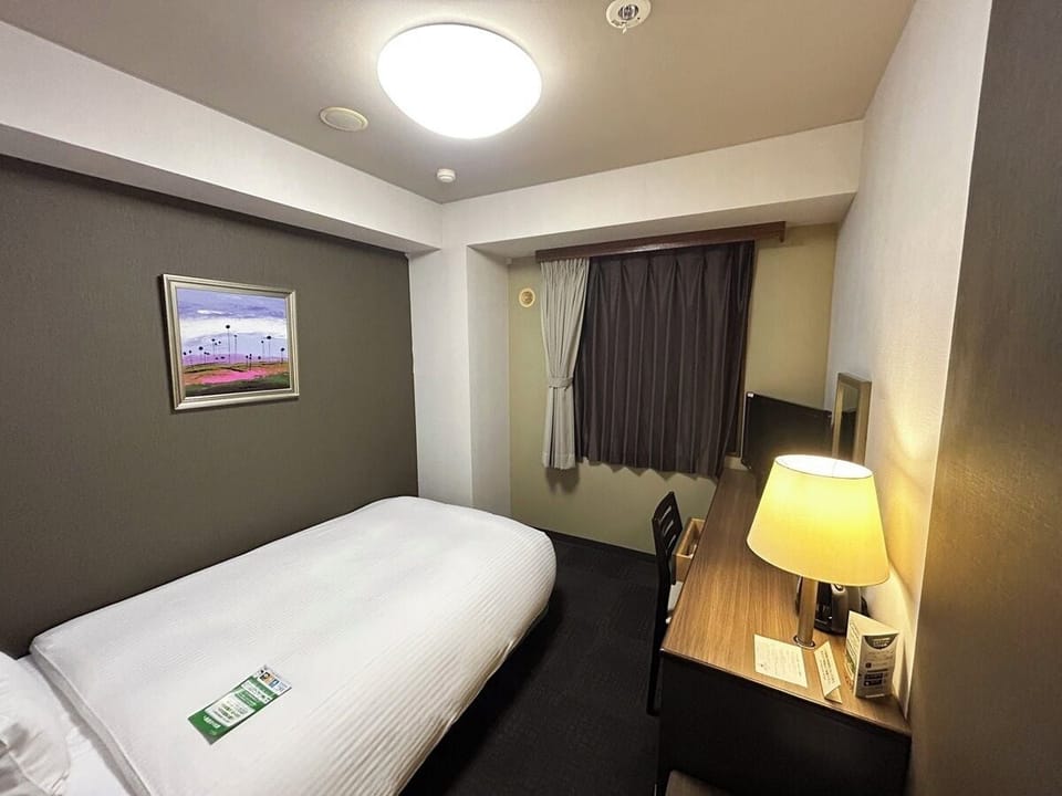 Desk, WiFi (free), bed sheets