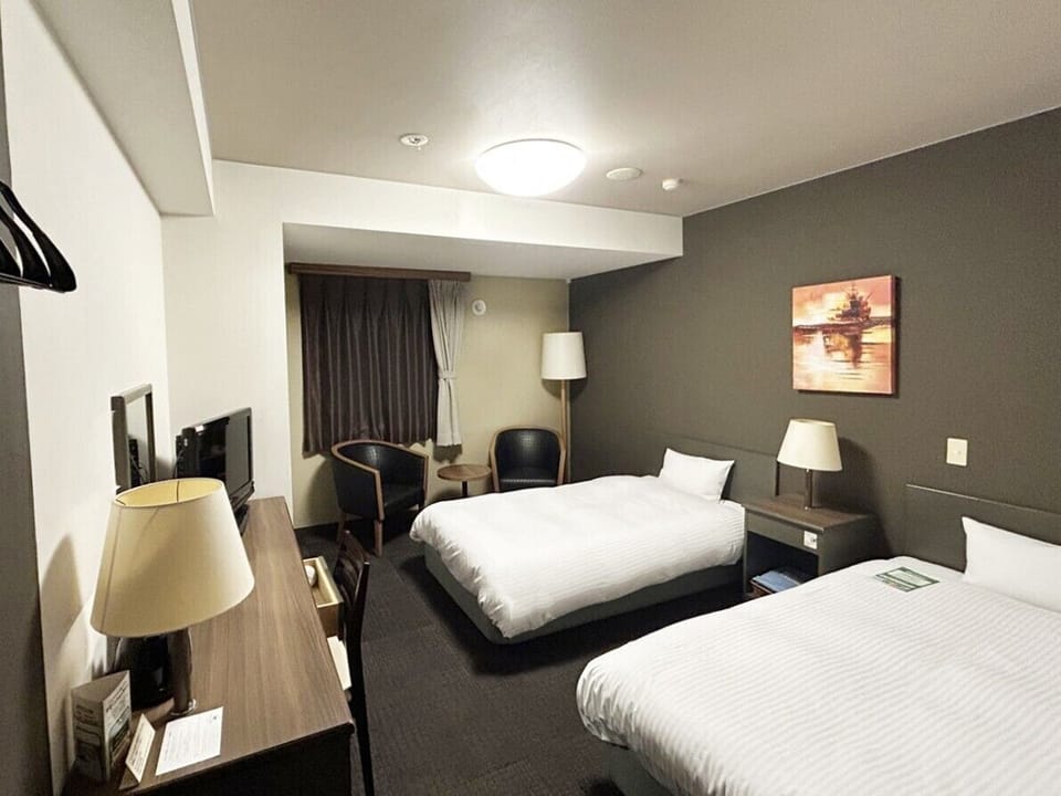 Desk, WiFi (free), bed sheets