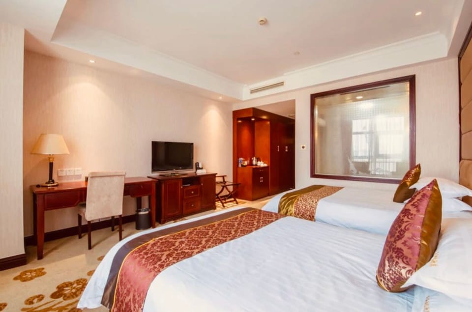 Deluxe Twin Room | 1 bedroom, premium bedding, down comforters, pillowtop beds