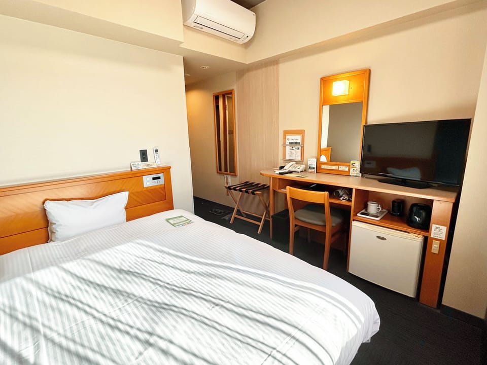 Desk, free WiFi, bed sheets