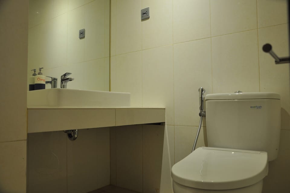 Shower, free toiletries, slippers, towels