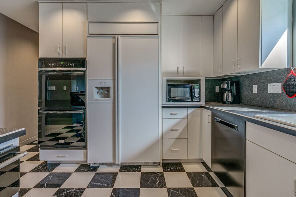 Sleek kitchen design with all the utensils you need for home-cooked meals