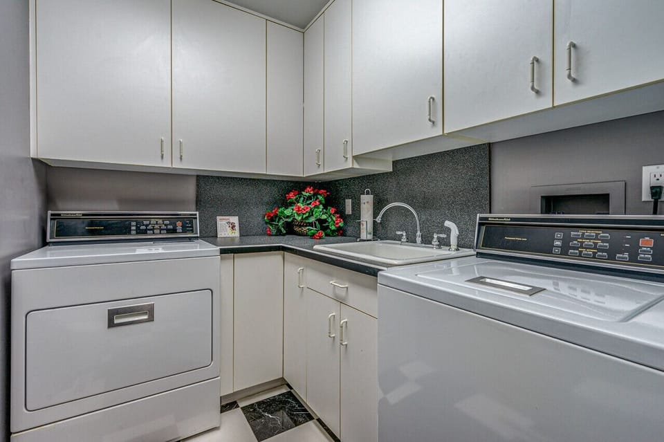 Make use of the convenient laundry room with a washer and dryer
