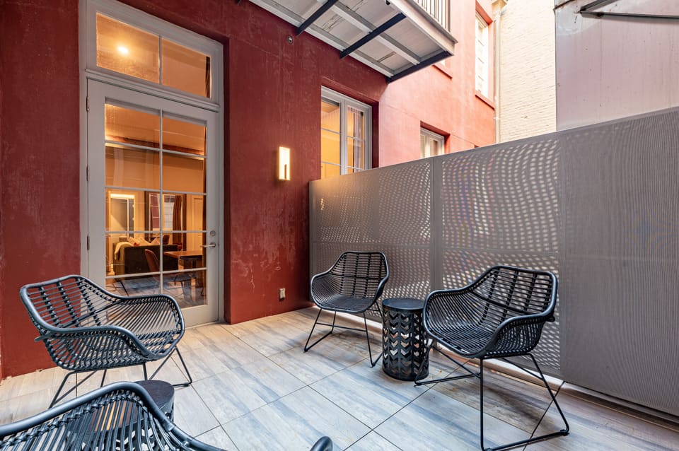 Private outdoor space with seating. Perfect for morning coffee or evening adult beverages!