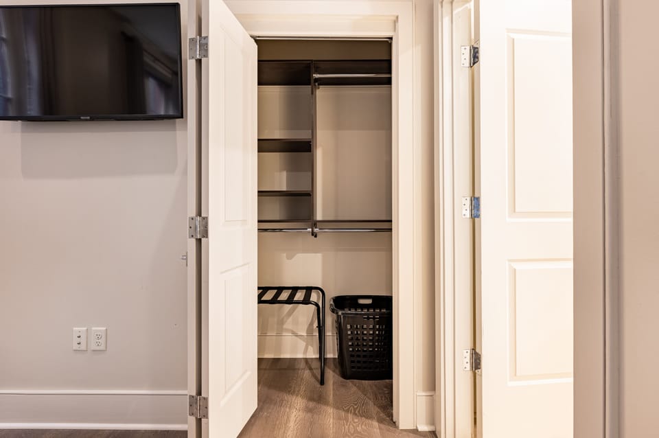Second closet in primary bedroom.