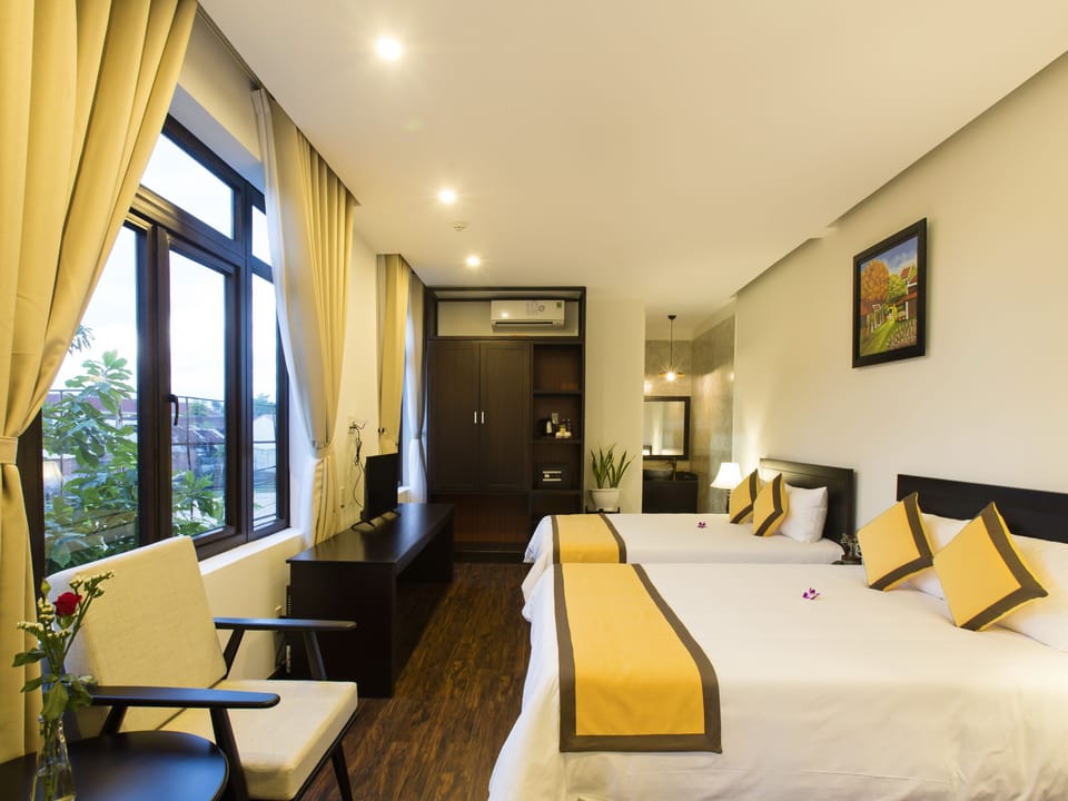 Family Suite, Balcony | Minibar, in-room safe, desk, soundproofing