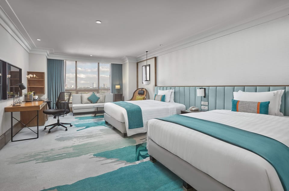 Suite, 2 Bedrooms | Minibar, in-room safe, desk, laptop workspace