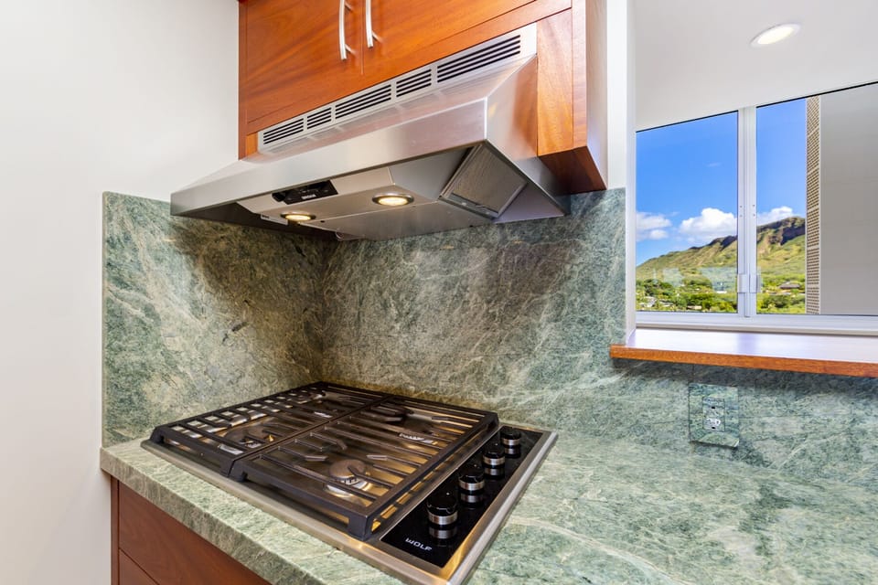 Kitchen - Gas cooking top makes for the ideal meal preparation and all your cooking needs in the fully-equipped, modern kitchen.