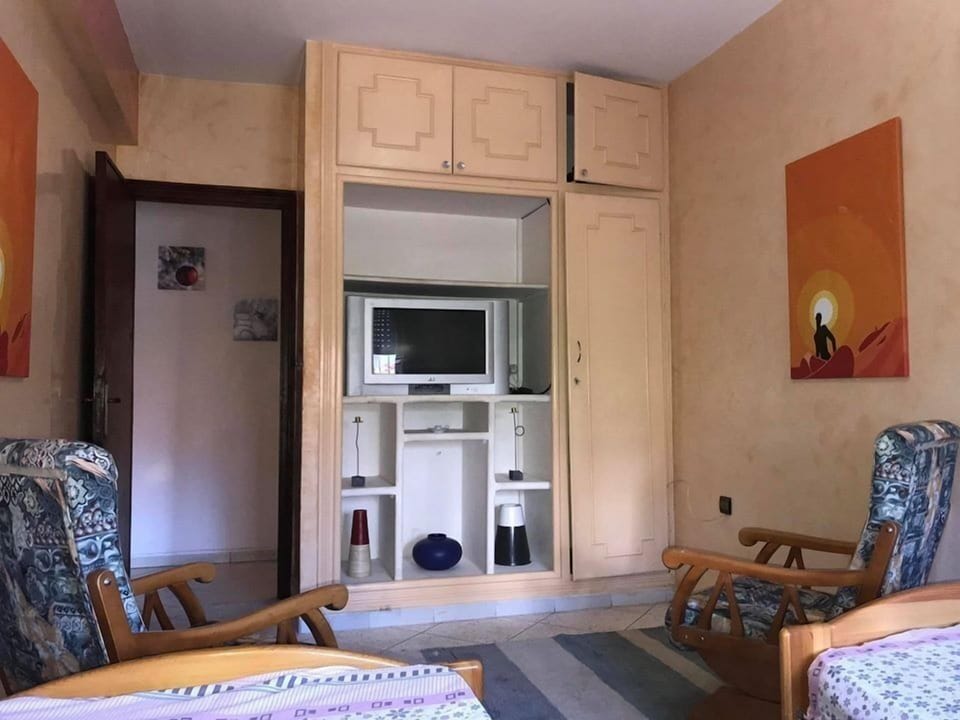 Apartment, 3 Bedrooms | Living area | 32-inch flat-screen TV with satellite channels, TV