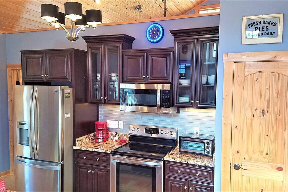 Stainless appliances and granite countertops.
