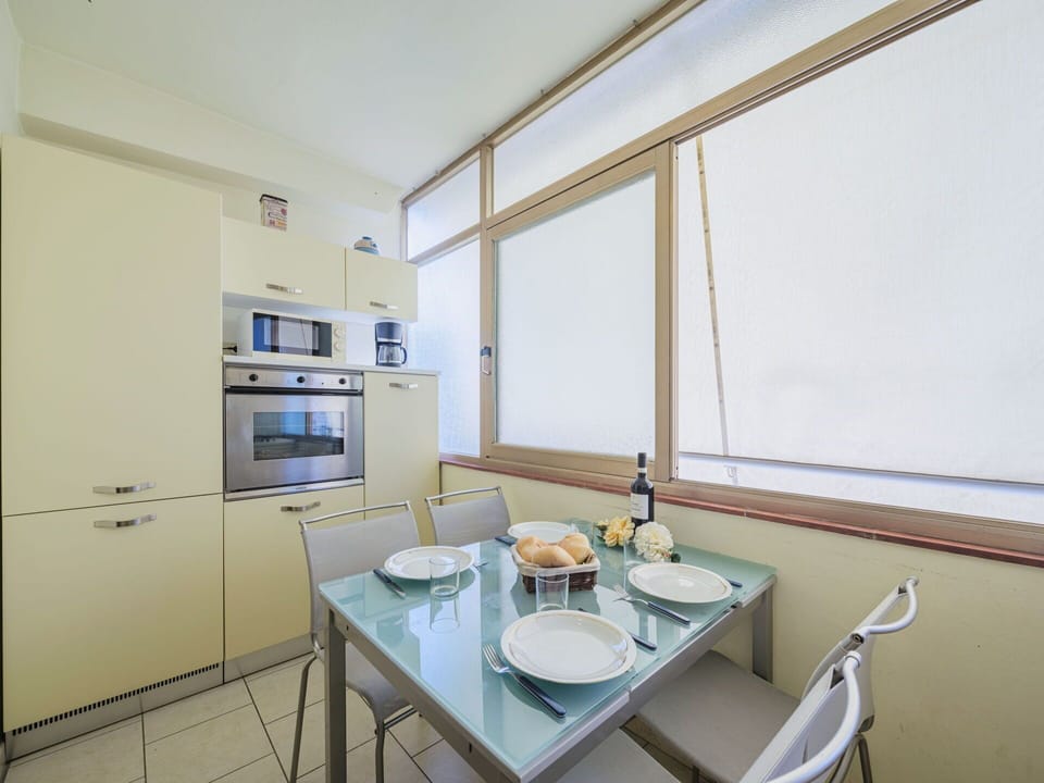 Property, Furniture, Table, Cabinetry, Wood, Window, Interior Design, Tableware, Building, Shelf