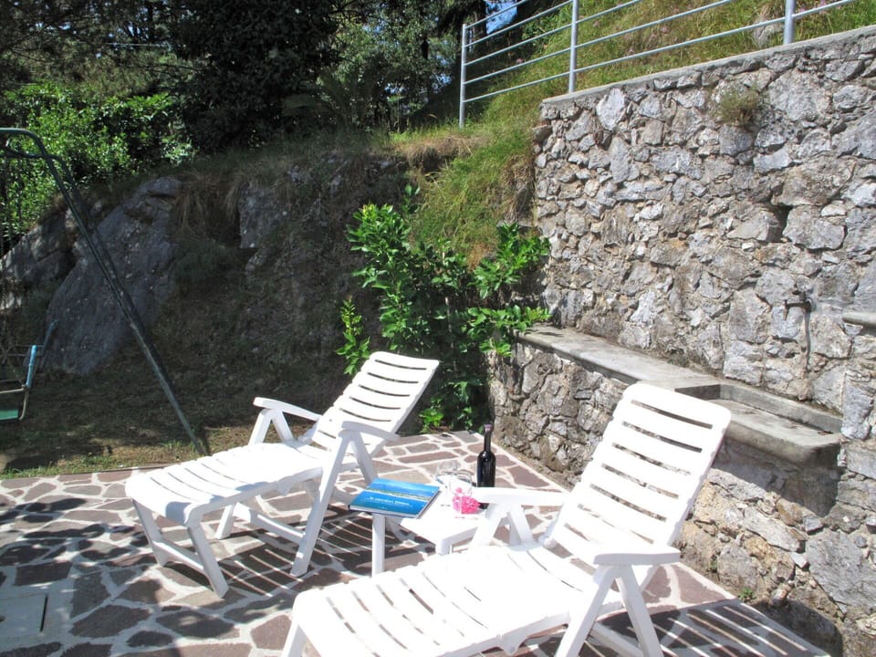 Property, Wall, House, Stone Wall, Tree, Room, Building, Cottage, Landscape, Chair