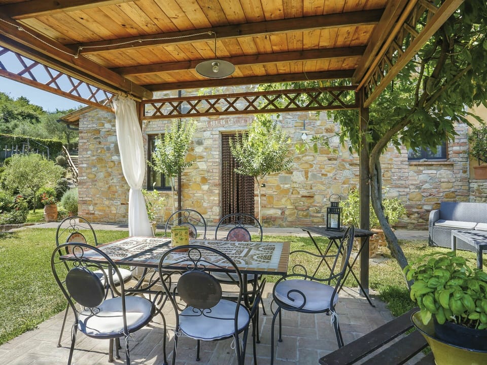 Plant, Furniture, Table, Property, Chair, Outdoor Table, Shade, Outdoor Furniture, Interior Design, Architecture