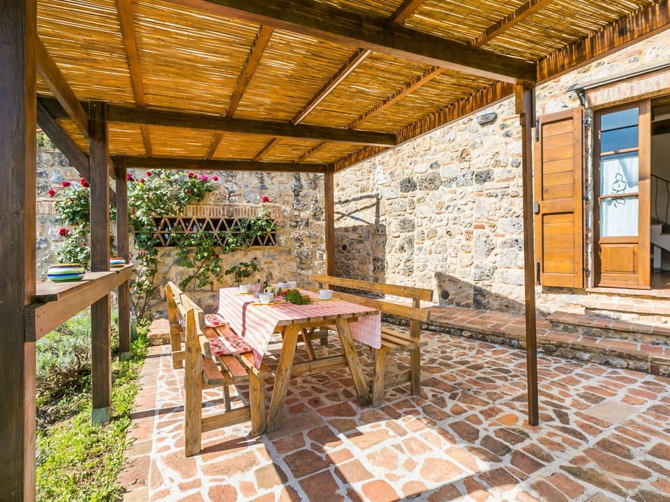 Furniture, Plant, Table, Building, Chair, Wood, Outdoor Table, Outdoor Furniture, Interior Design, Shade