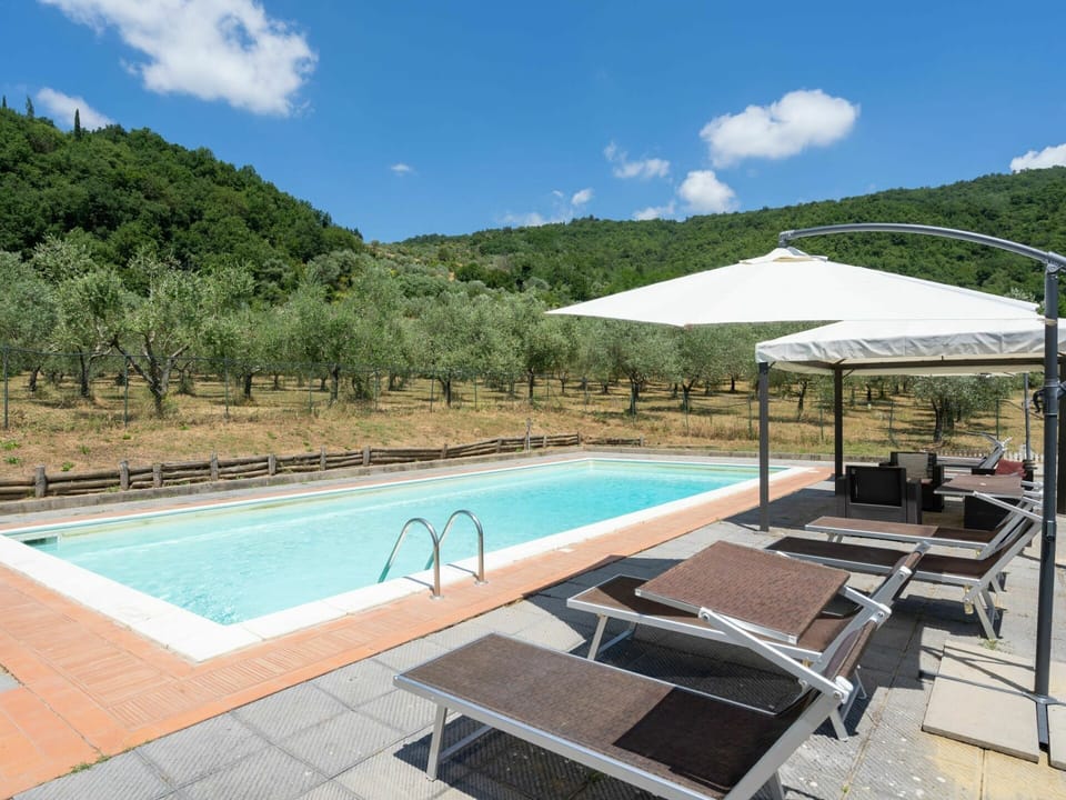 Cloud, Water, Sky, Property, Swimming Pool, Building, Shade, Umbrella, Outdoor Furniture, Tree