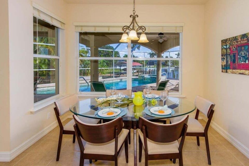 Formal Dining Area with Views of the  Water and Lanai
