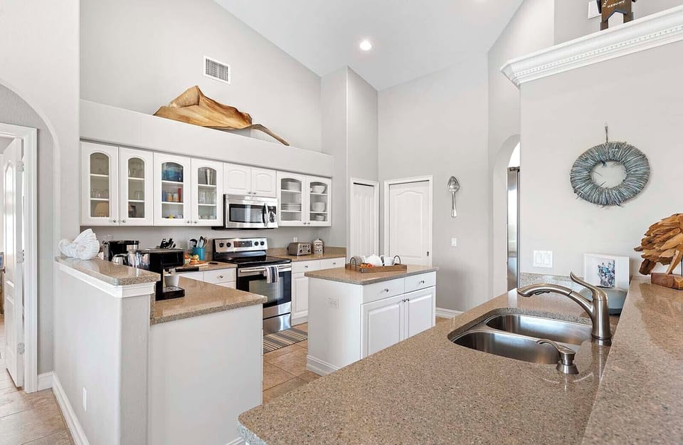Large Kitchen with Island and Stainless Appliances