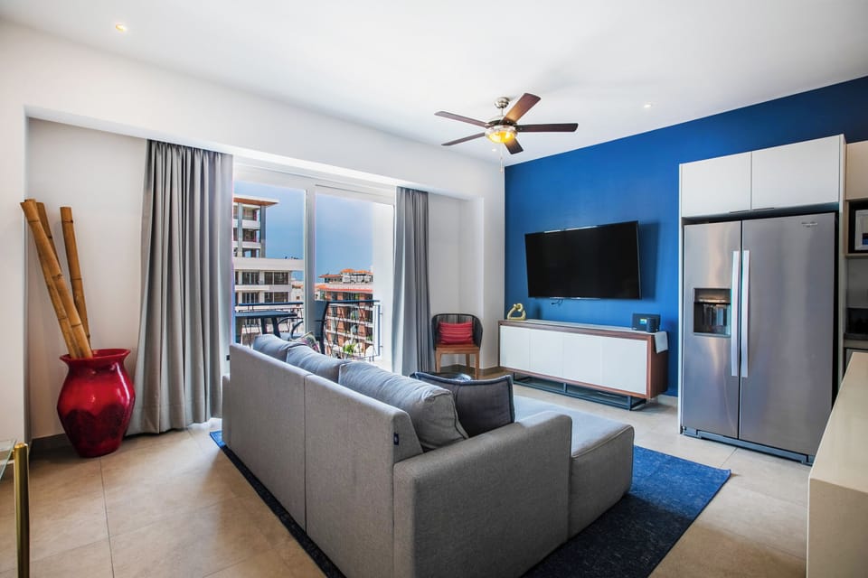 Comfortable living room with sofa bed and smart TV