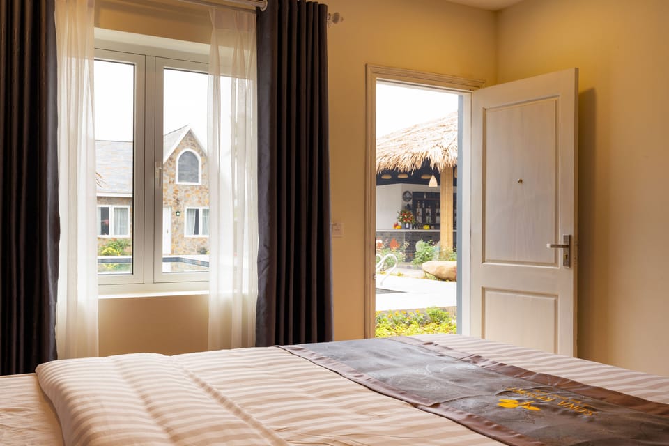 Deluxe Double Room, Pool View | Minibar, desk, laptop workspace, soundproofing