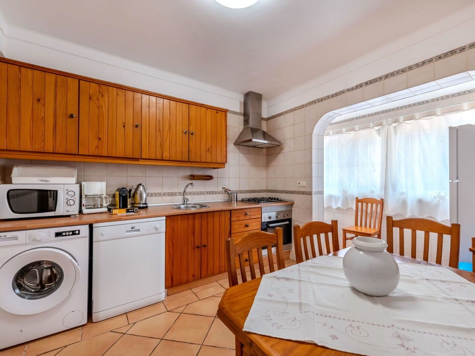 Flooring, Floor, Interior Design, Major Appliance, Ceiling, Kitchen, Room, Cabinetry, Furniture, Apartment
