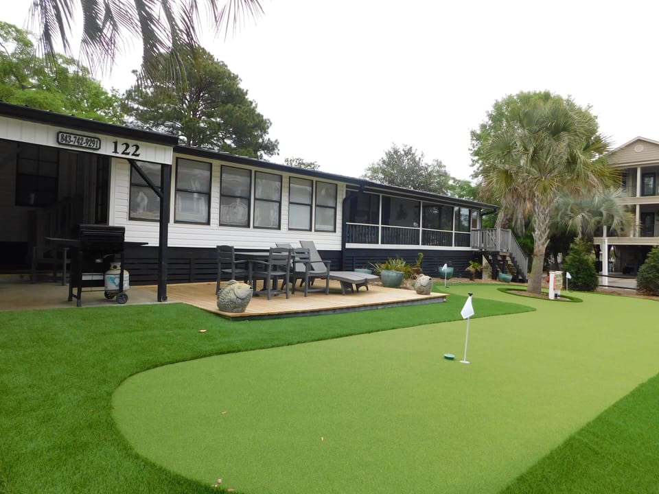 MH122, new putt putt area in front yard