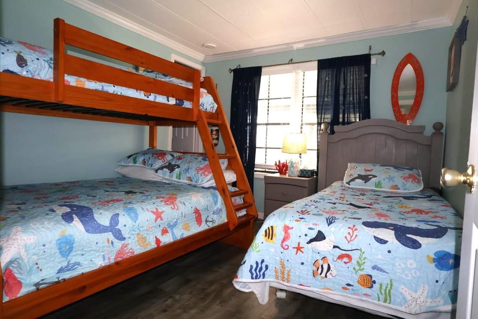 Kids room, with twin over full bunk bed and twin bed.