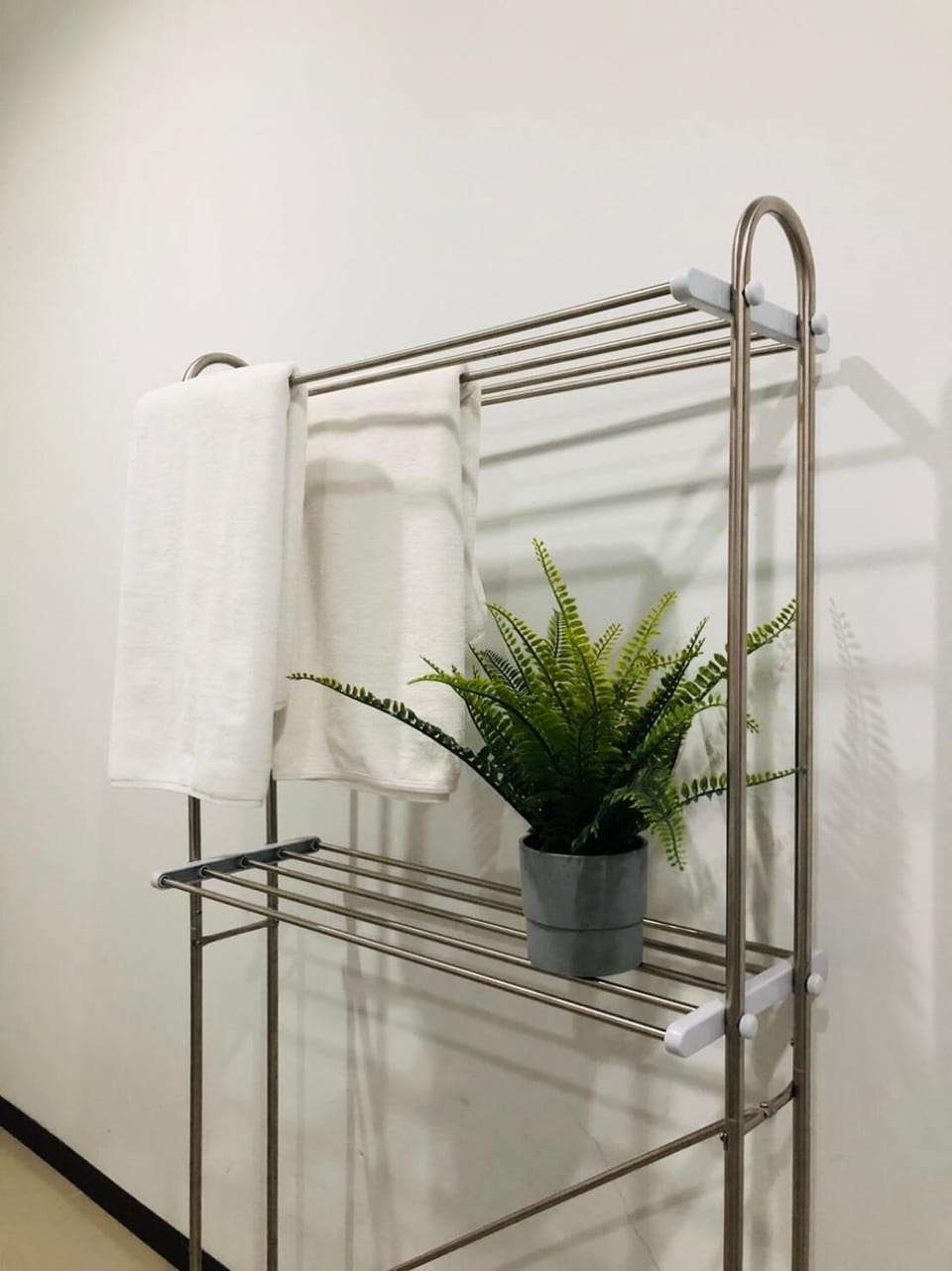 Shower, hair dryer, slippers, towels