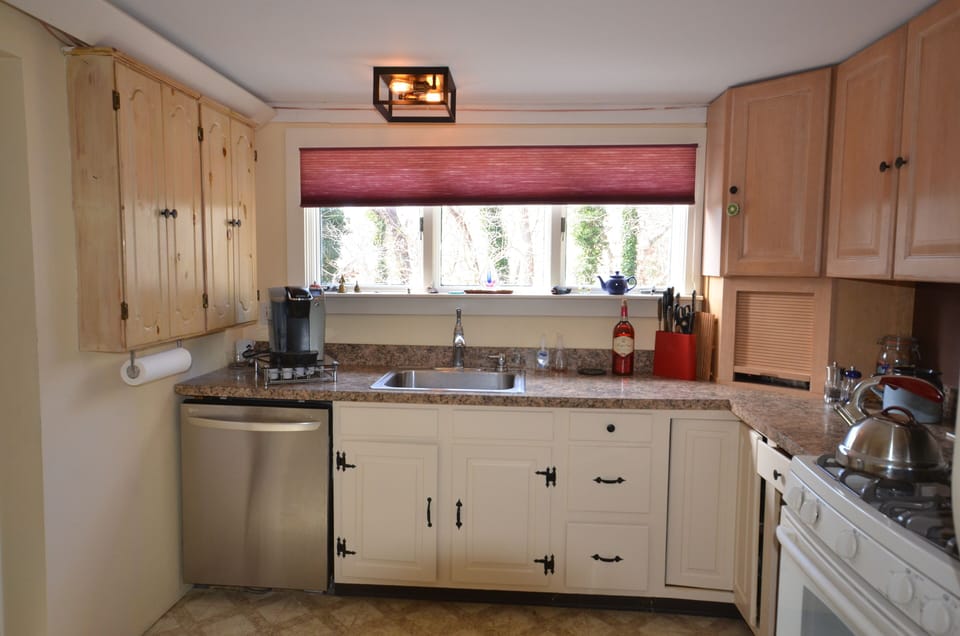 Kitchen, pantry is to the left with lots of storage space for food, more dishes