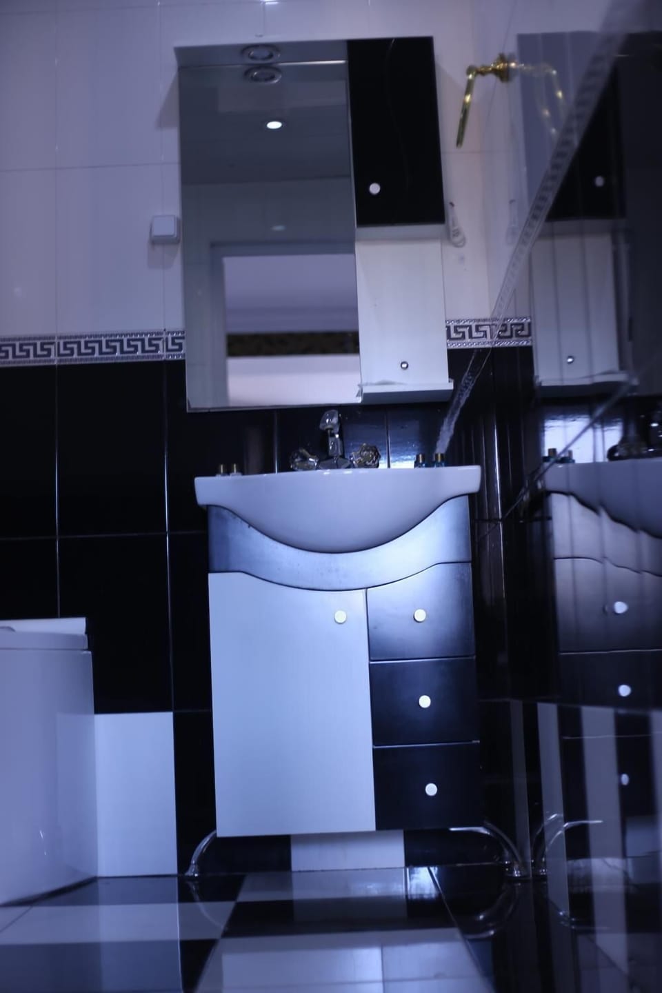 Shower, rainfall showerhead, towels, soap