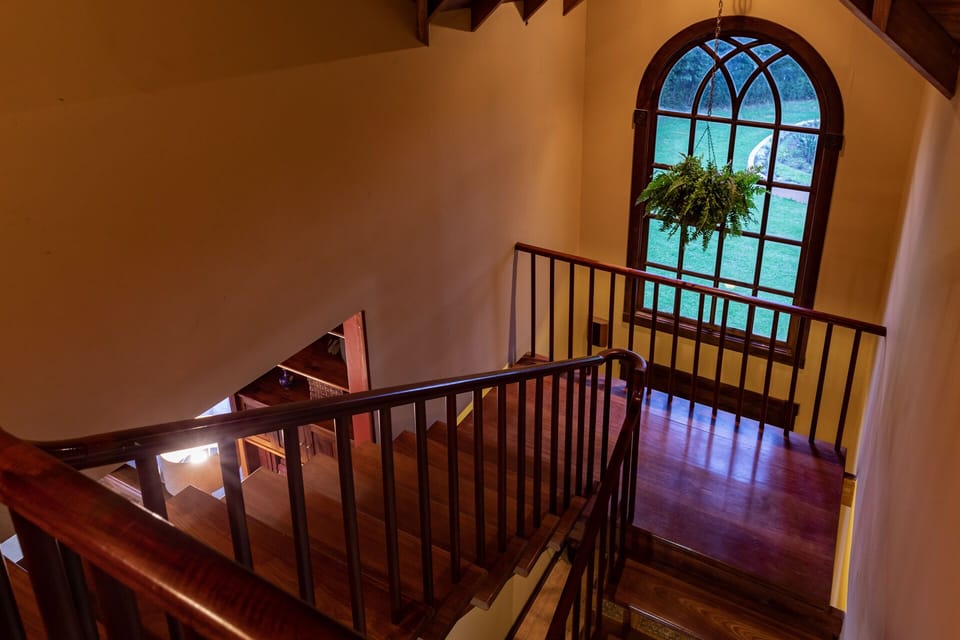 Open stairs from second floor to first floor.