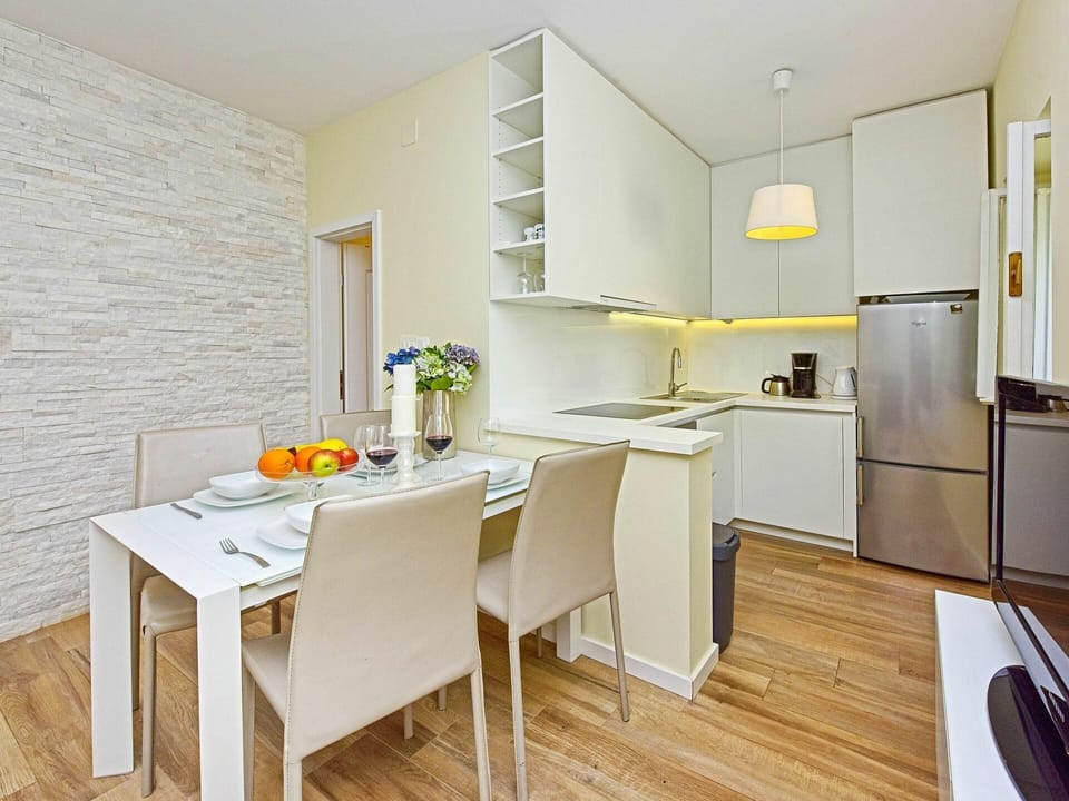 Furniture, Cabinetry, Table, Countertop, Kitchen, Tableware, Wood, Interior Design, Flooring, Chair