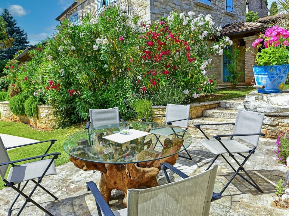 Flower, Plant, Furniture, Building, Window, Chair, Flowerpot, Botany, Outdoor Table, Outdoor Furniture