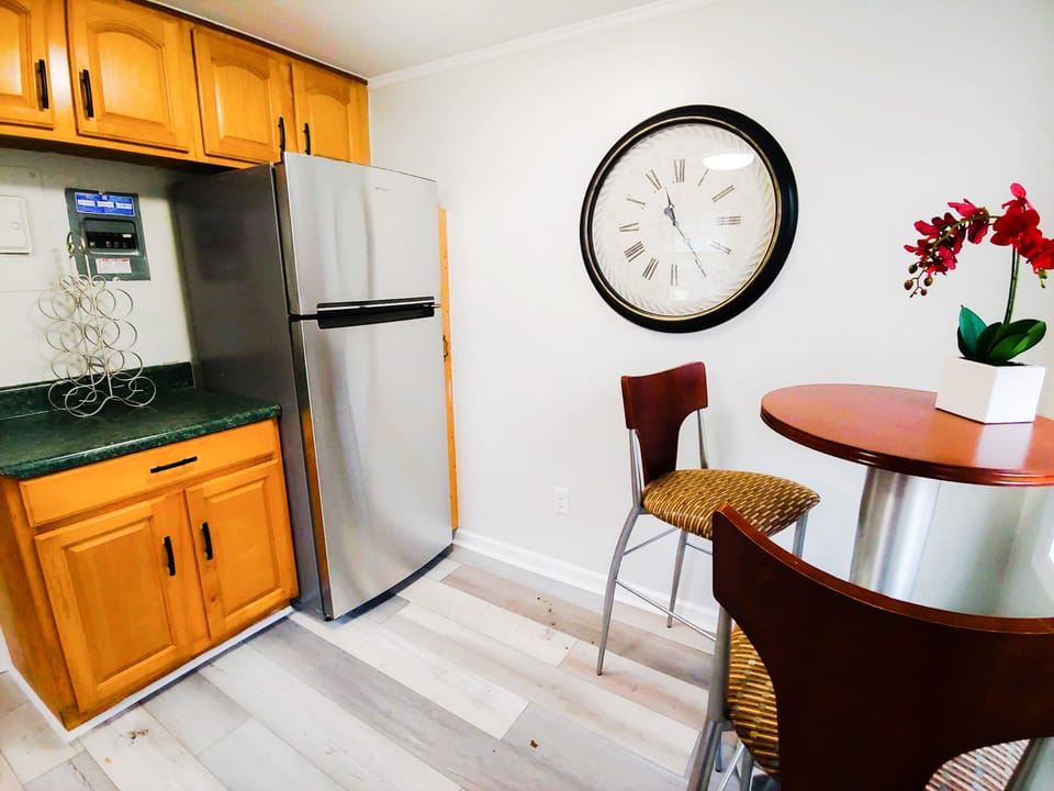 The kitchen also includes a dinette set for quick meals or a snack.