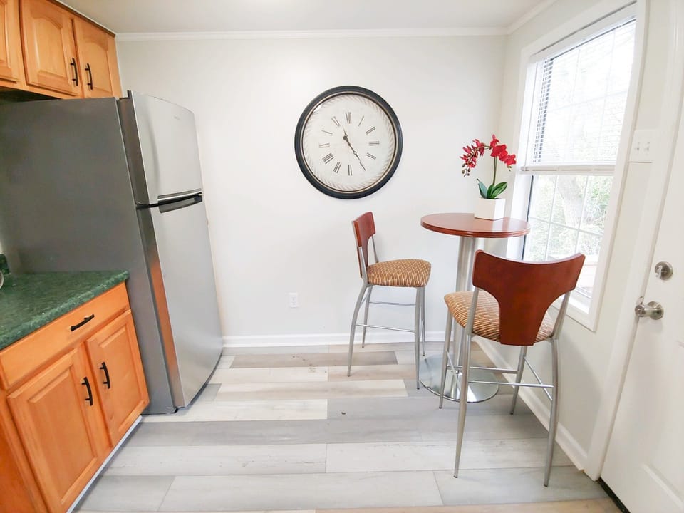 The kitchen also includes a dinette set for quick meals or a snack.