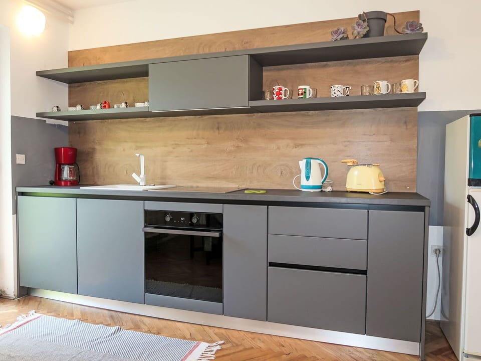 Kitchen, Furniture, Flooring, Wood, Interior Design, Cabinetry, Kitchen Appliance, Countertop, Room, Floor