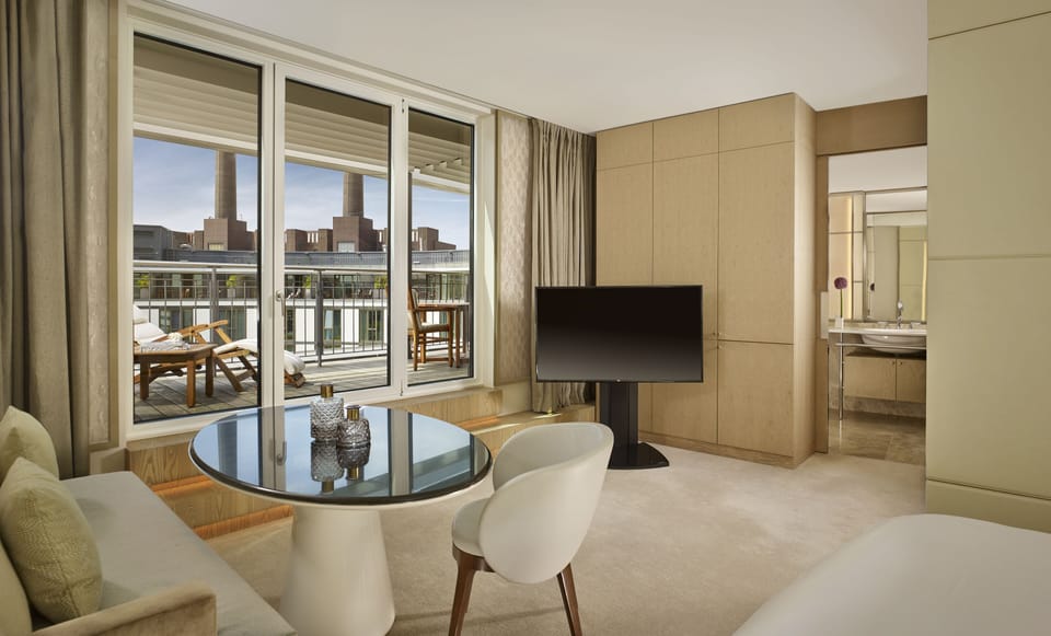 Flat-screen TV, DVD player, iPod dock, pay movies