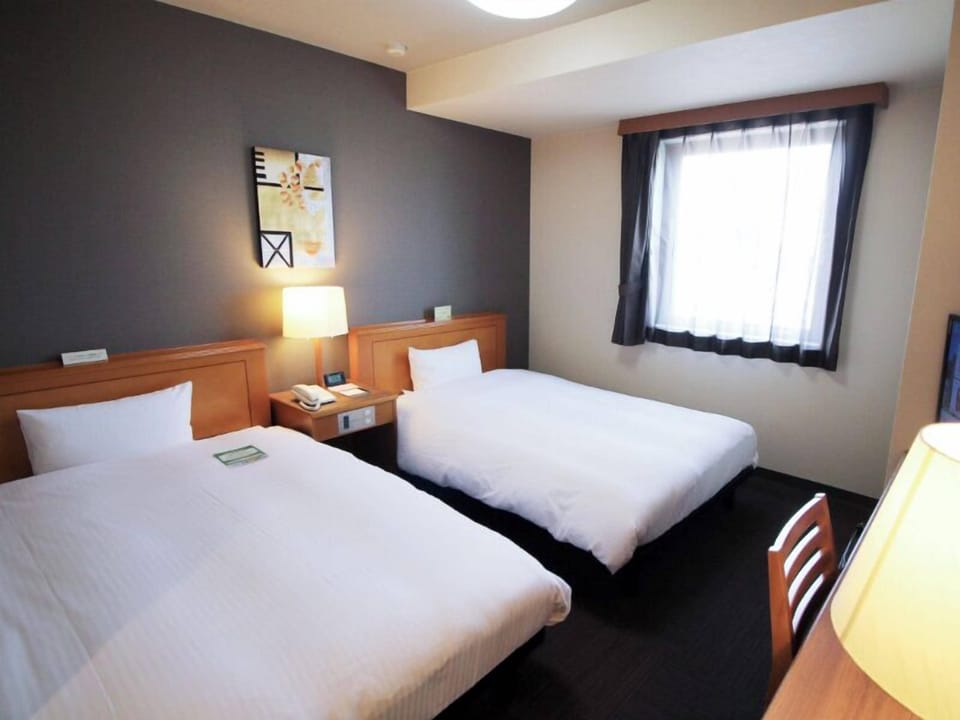 Desk, WiFi (free), bed sheets