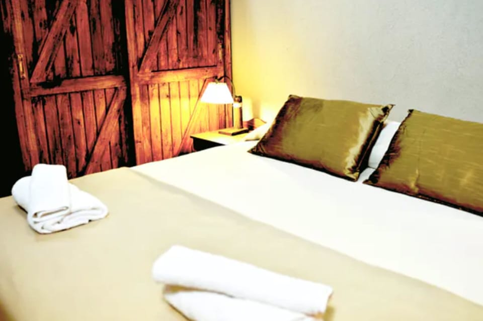Premium bedding, down comforters, pillowtop beds, minibar
