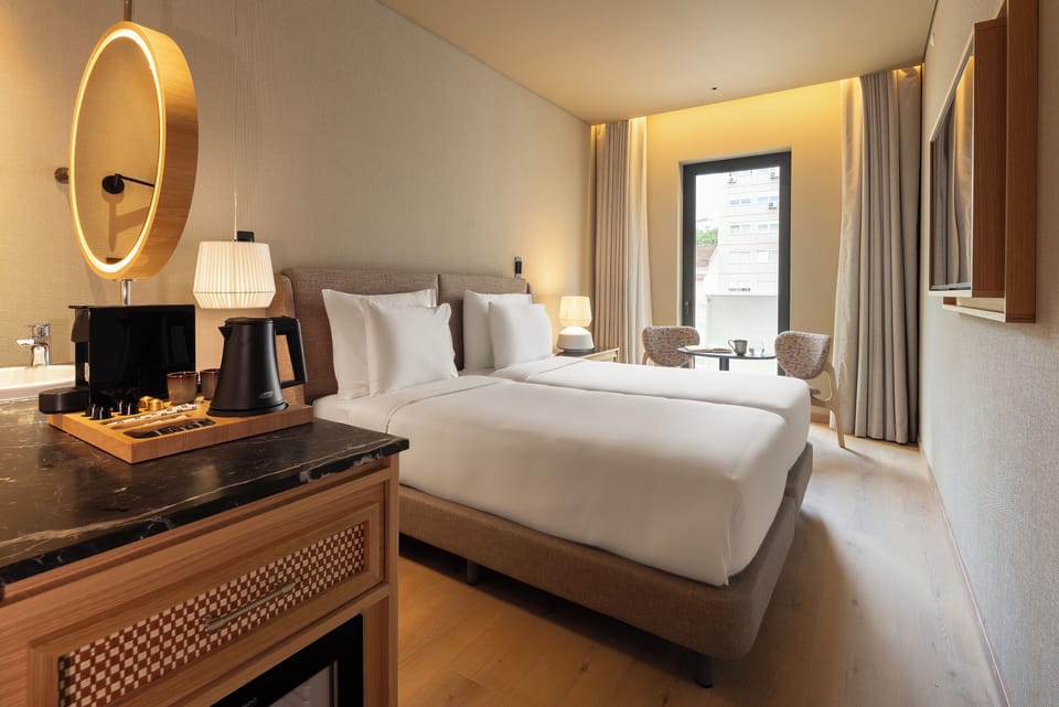 Double or Twin Room, Balcony (Cool Varanda) | Minibar, in-room safe, desk, laptop workspace