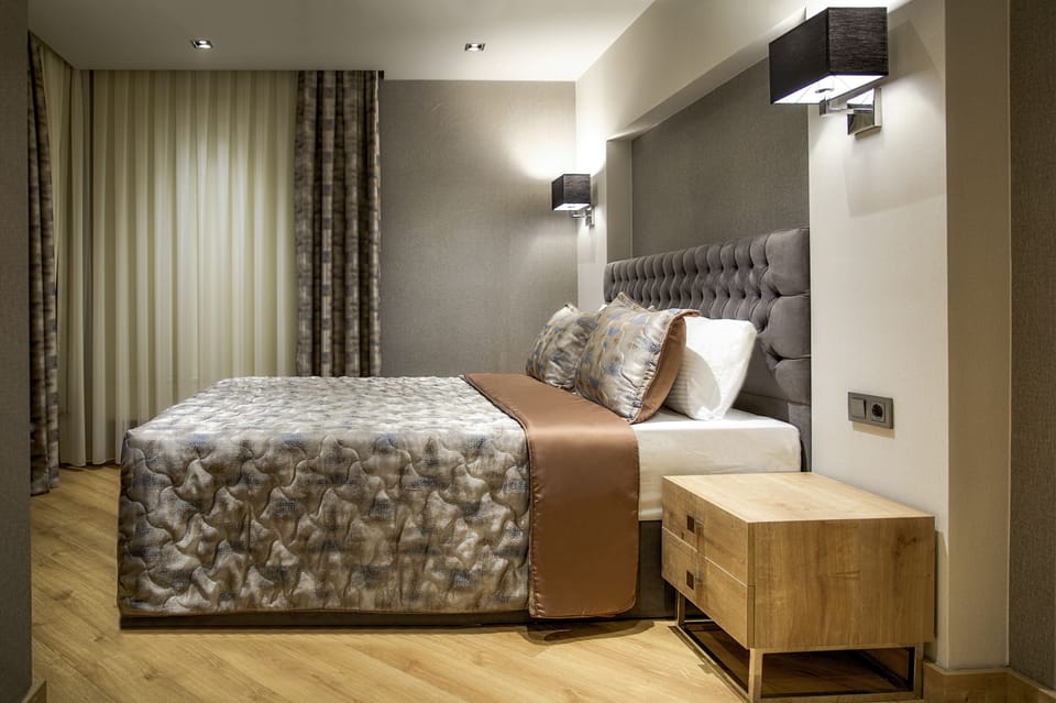 Premium bedding, minibar (some free items), in-room safe