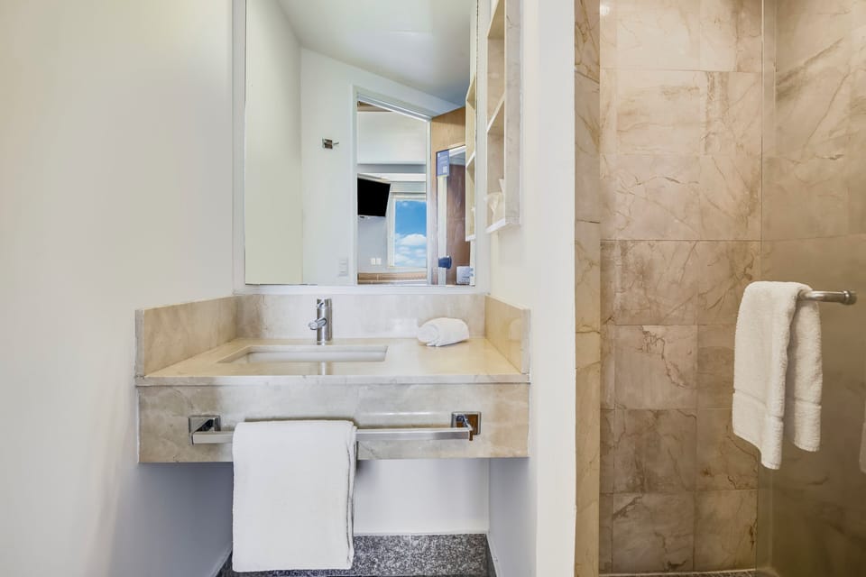 Shower, towels, soap, shampoo