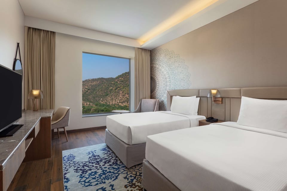 Egyptian cotton sheets, premium bedding, minibar, in-room safe