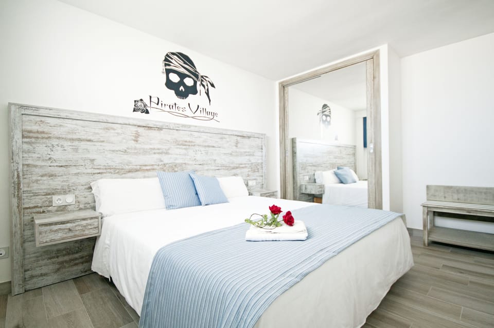 Apartment, 1 Bedroom | 1 bedroom, in-room safe, desk, iron/ironing board