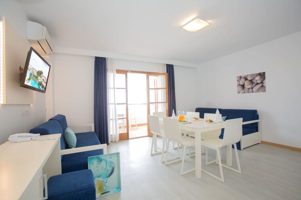 Apartment, 1 Bedroom | In-room safe, desk, laptop workspace, iron/ironing board