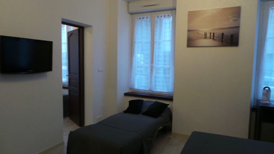 Family Room | Premium bedding, individually decorated, individually furnished, desk