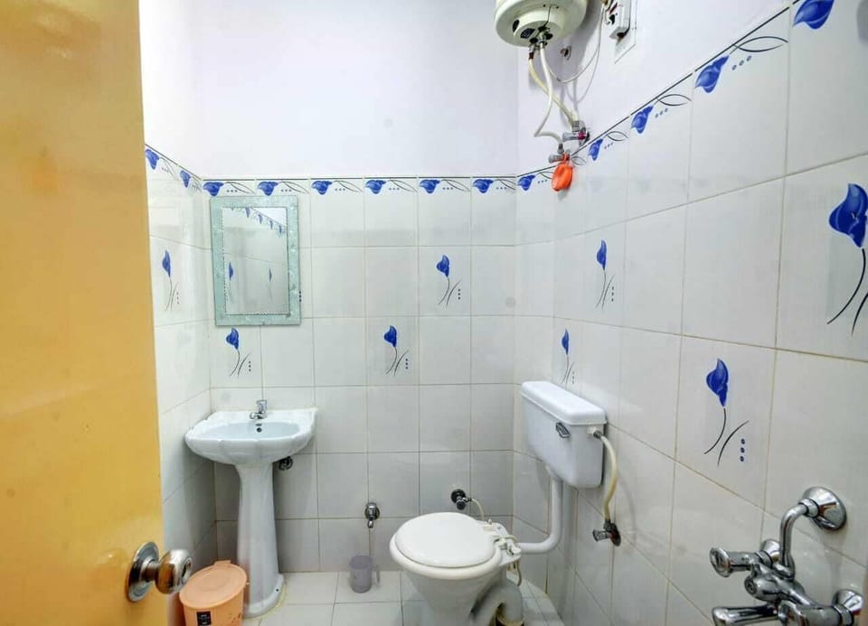 Shower, designer toiletries, bathrobes, slippers
